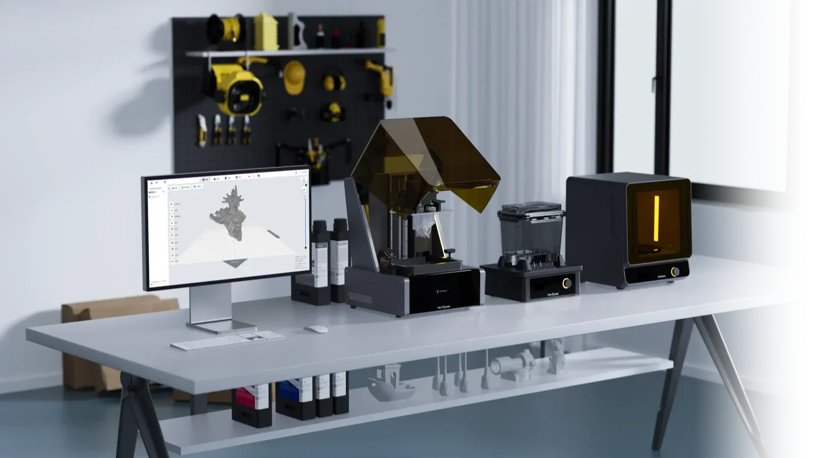 HeyGears resin 3D printer setup with wash and cure stations beside a CAD preview screen.