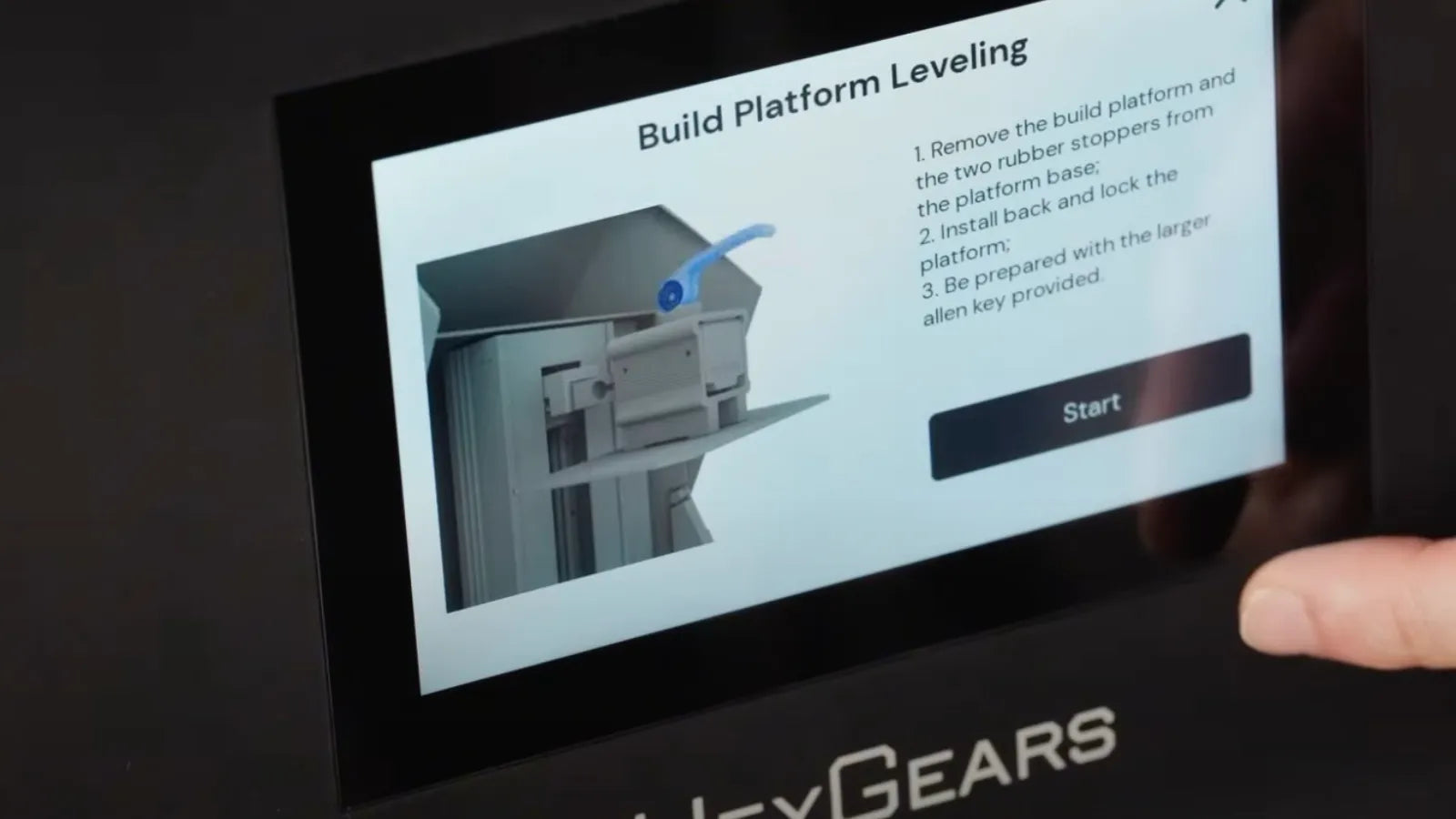 HeyGears 3D printer touchscreen showing build platform leveling setup for resin jewelry printing.