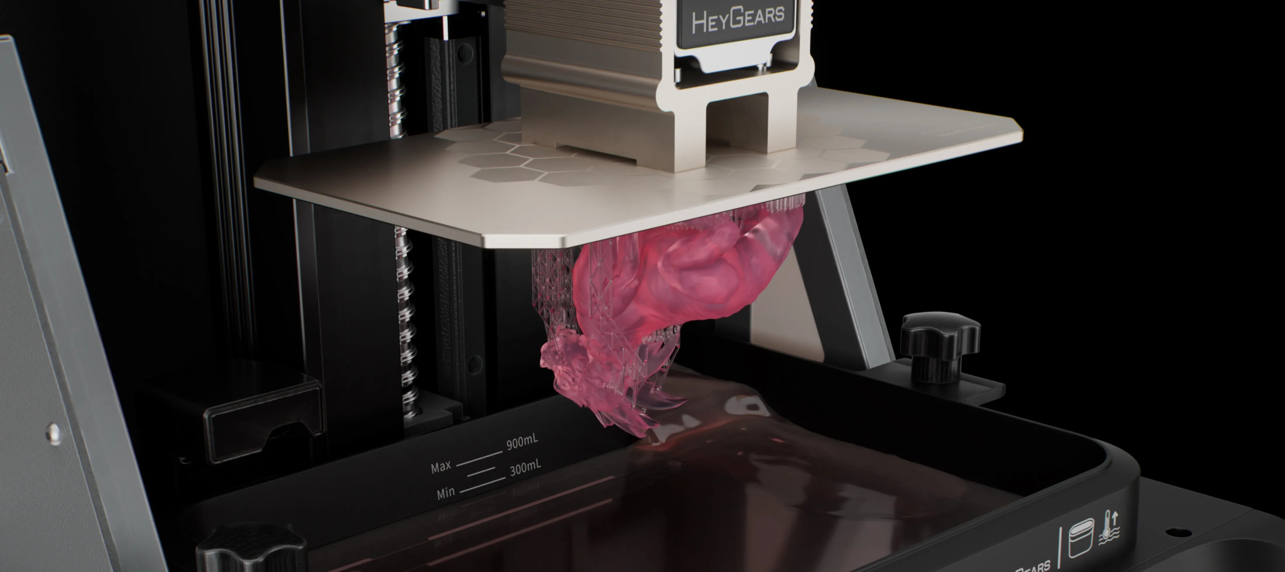 HeyGears resin 3D printer creating pink detailed model with PAWW20 resin