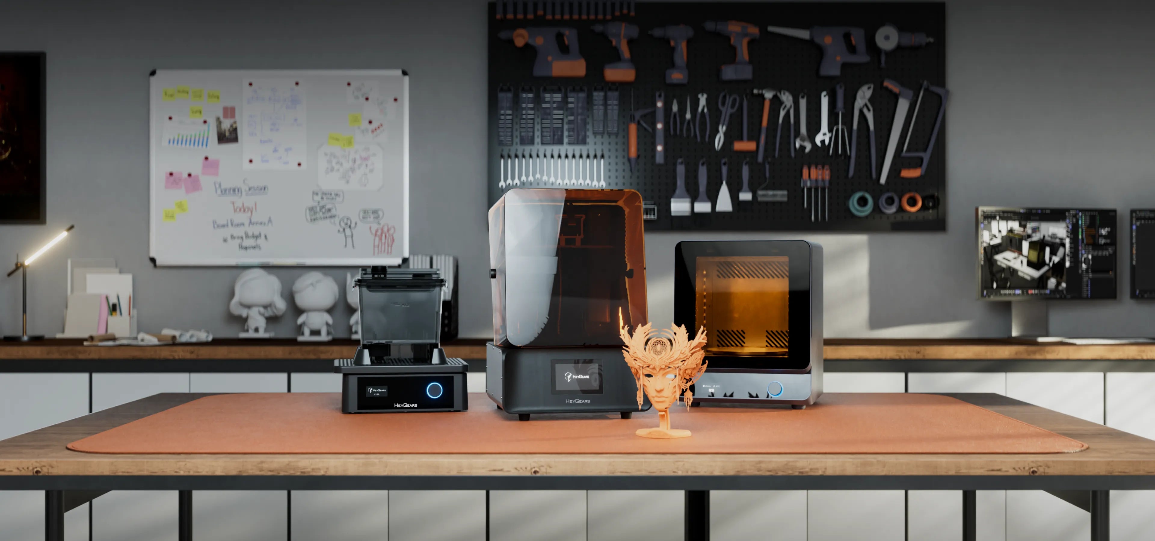 HeyGears RS resin 3D printing system with post-processing equipment and printed figurine in workshop