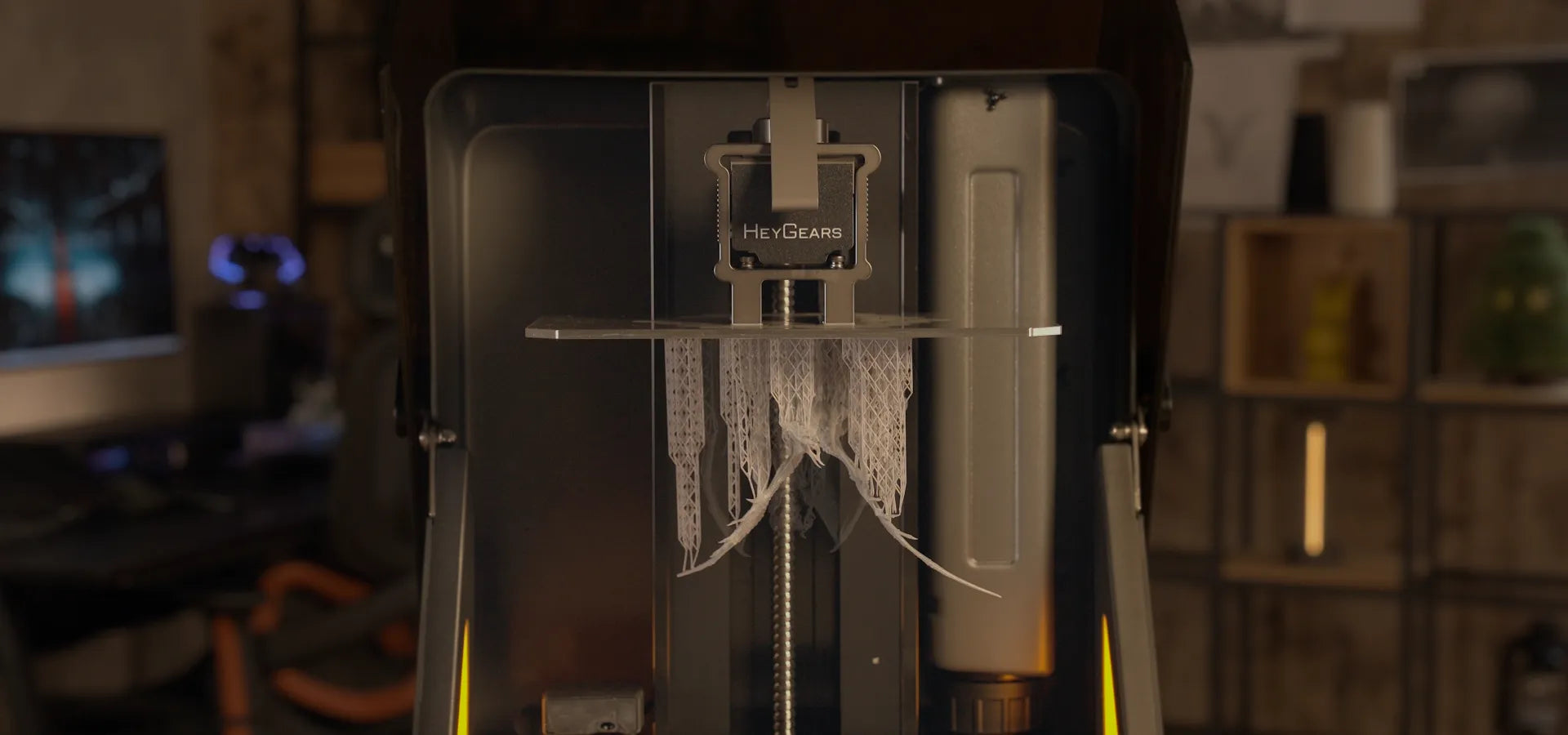 HeyGears RS Turbo resin 3D printer creating intricate lattice structure with injection-molded precision in 2 hours