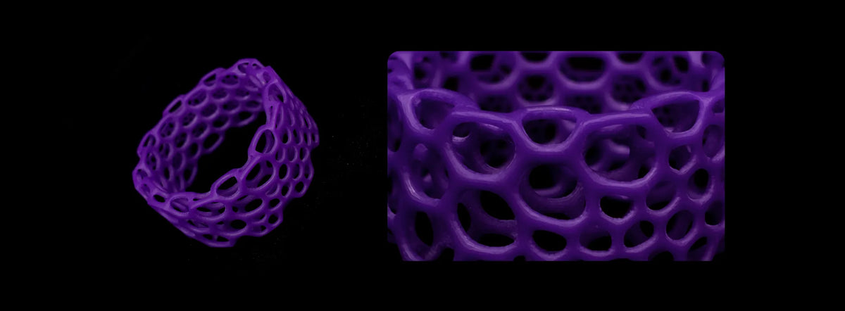Openwork ring printed with HeyGears PAC10 wax casting resin alongside a close-up view showing smooth edges and detailed lattice geometry.